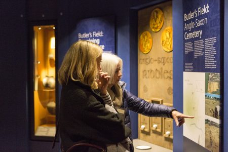 Two ladies looking at a museum display
