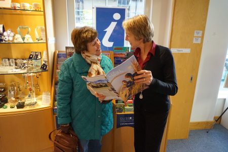 Two ladies talking in the visitor information centre
